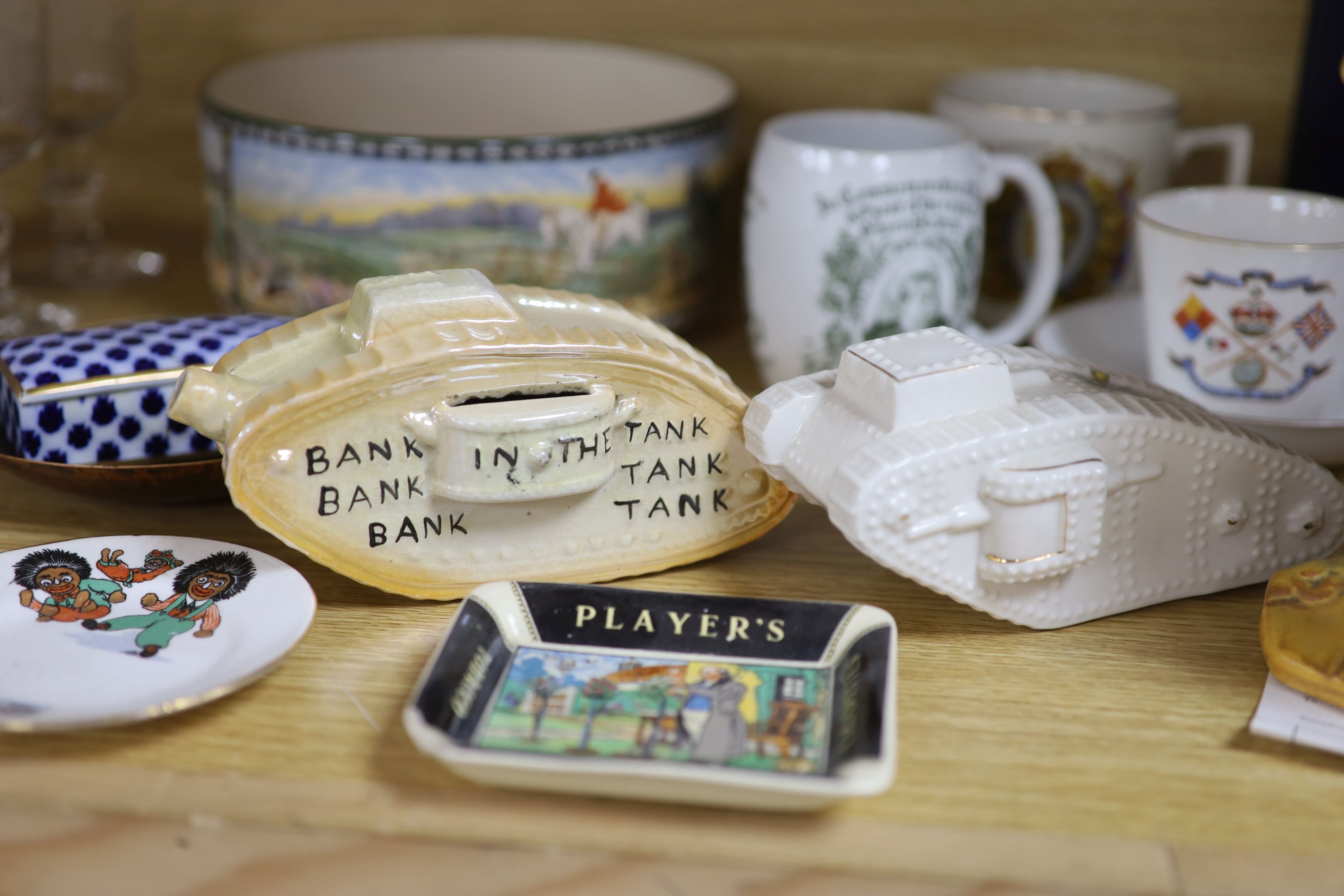 A quantity of mixed ceramics including commemorative wares, a Kitchener jug, Royal Doulton, etc.